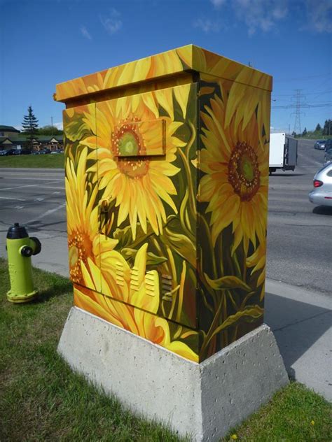 decoration near yard electric boxes|painting utility boxes in yard.